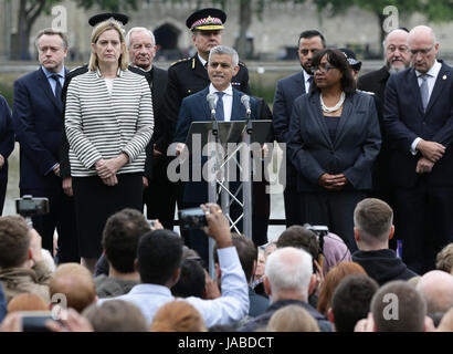 Mayor of London Sadiq Khan (centre) Home Secretary Amber Rudd (centre left) and Shadow Home Secretary Diane Abbott (centre right) during a vigil in Potters Fields Park, central London in honour of the London Bridge terror attack victims. Stock Photo