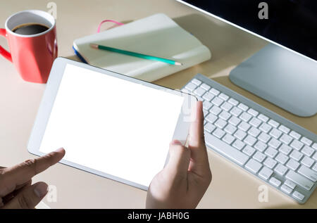 internet Man using tablet computer isolated on over Black background Stock Photo