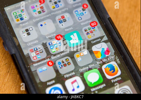 Apps and social media apps on an iPhone 5s. Stock Photo