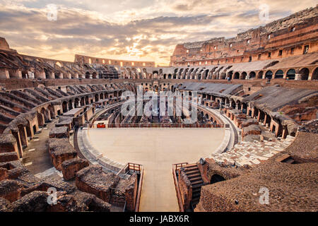 Scenic view of Roman Colosseum interior at sunset, Rome, Italy Stock Photo