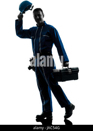 one caucasian repairman worker saluting silhouette in studio on white background Stock Photo