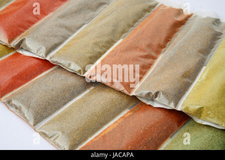 Close up of various ground spices packets Stock Photo