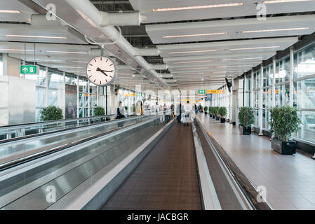 Amsterdam, Netherlands - August 10, 2016. Schiphol Airport. Mechanical walkways. It is the main international airport of the Netherlands Stock Photo
