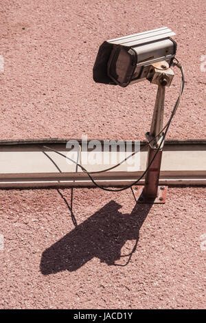 Surveillance CCTV security camera on the wall Stock Photo