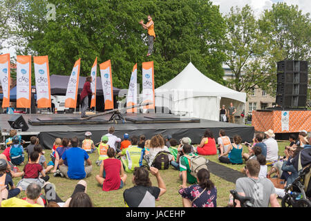 Montreal, CANADA - 4 June 2017: Circus artist performing outside In Jeanne Mance Park Stock Photo