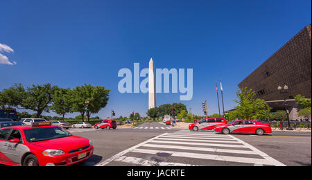 WASHINGTON, DC, USA - Smithsonian National Museum of African American History and Culture at right, and the Washington Monument, left. Stock Photo