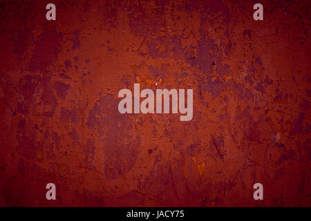Rough textured bright red concrete grunge background Stock Photo