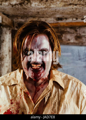 Photo of a hungry zombie staring at you. Stock Photo