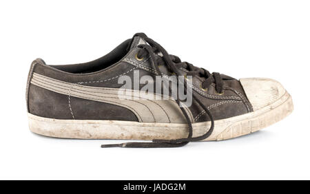 Old dirty sneakers isolated on white background Stock Photo