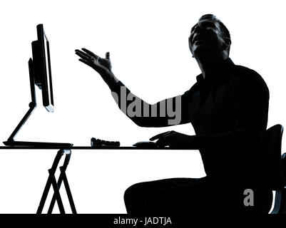 one caucasian business man computer computing happy silhouette in studio isolated on white background Stock Photo