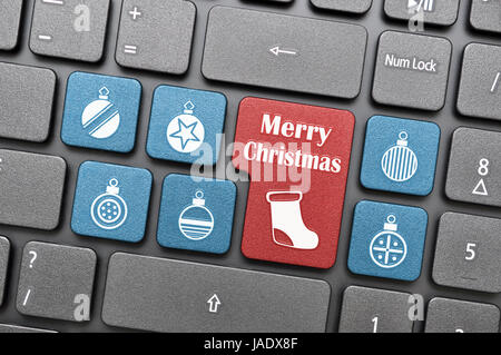 Red and blue Christmas symbols on keyboard Stock Photo