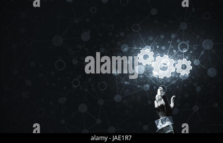 Technology conceptual image with gear digital symbol on dark bac Stock Photo
