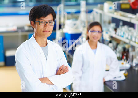 Portrait of Laboratory Scientist in the lab Looking at camera Stock Photo
