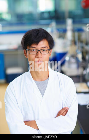 One male Chinese Laboratory scientist working at lab with test tubes Stock Photo