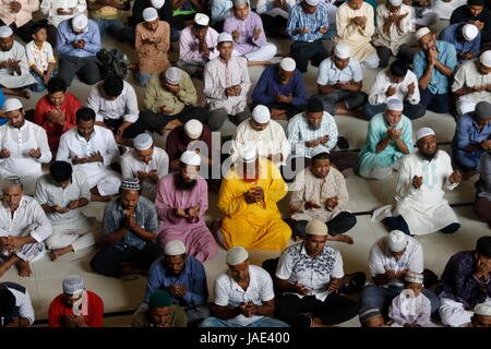 Devotees offer the Jummah prayers at the Baitul Mukarram National Mosque in Dhaka on the first Friday of the month of Ramadan. Dhaka, Bangladesh Stock Photo