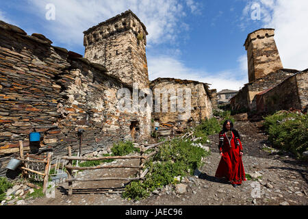 Georgian woman in national costumes in the village Ushguli, in Georgia. Stock Photo