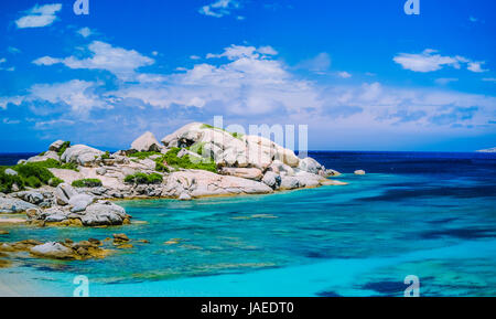 Bizarre granite rocks formation in amazing azure water on beautiful Sardinia island near Porto Pollo, Sargedna, Italy Stock Photo