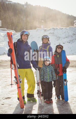 Portrait of happy family in skiwear during winter Stock Photo