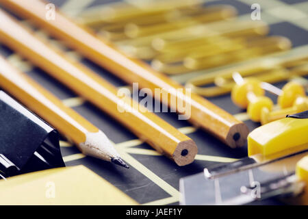 Yellow school accessories on the foreground Stock Photo