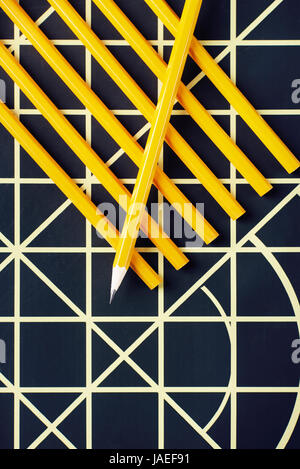 Arrangement of pencils on the pattern paper Stock Photo