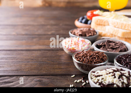 Assorted dutch hagelslag sprinkles. Netherlands traditional sweets for breakfast. Copy space. Stock Photo