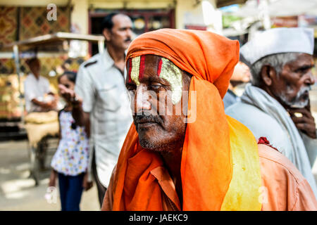 Pushkar, Rajasthan, India - May 29, 2016: Portrait of an unidentified Sadhu (holy man), on a pilgrimage to the holy lake Pushak Sarovar in the town of Stock Photo