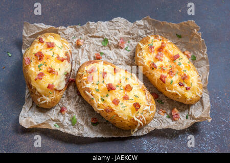 Baked stuffed potatoes with cheese and bacon Stock Photo