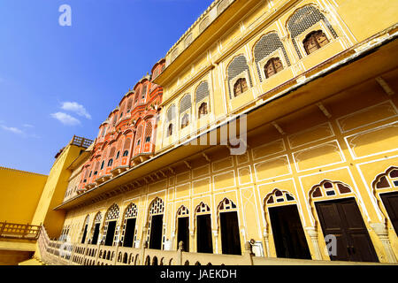 Hawa Mahal is a beautiful palace in Jaipur (Pink City), Rajasthan, also known as Palace of Winds or Palace of the Breeze, constructed of red and pink  Stock Photo