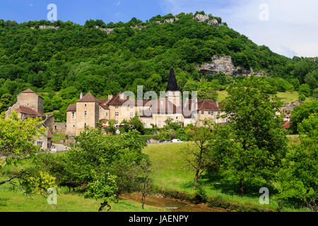 France, Jura, Baume les Messieurs, labelled Les Plus Beaux Villages de France (The Most beautiful Villages of France), abbey and the Cuisance river Stock Photo