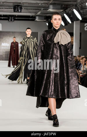 London, UK. 6th June, 2017. A model walks the runway wearing a collection created by Milly Morgan from Norwich University of the Arts during Graduate Fashion Week 2017 at the Old Truman Brewery. Graduate Fashion Week is an annual event that showcases recent graduates' collections from the UK's leading fashion colleges and university courses in a series of fashion shows and exhibitions. Credit: Vibrant Pictures/Alamy Live News Stock Photo