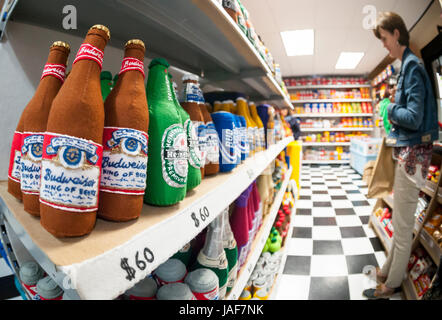 A selection of felt beer in UK artist Lucy Sparrow's bodega installation, '8 'till Late', stocked completely with all-felt facsimiles of products is seen in the trendy Meatpacking District in New York on Tuesday, June 6, 2017. The 1200 square-foot bodega features items found in the typical New York bodega including snacks, beer, candy, cigarettes and a deli cat. The plush merchandise is all for sale and since there is no back-stock once a product is sold out, its gone. The bodega will be up and running until June 30. ( © Richard B. Credit: Richard Levine/Alamy Live News Stock Photo