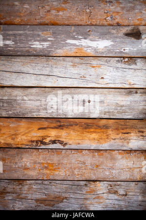 Building wall made from snag, dead wood Stock Photo