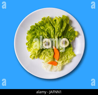 art food, funny face made of vegetables on the plate Stock Photo