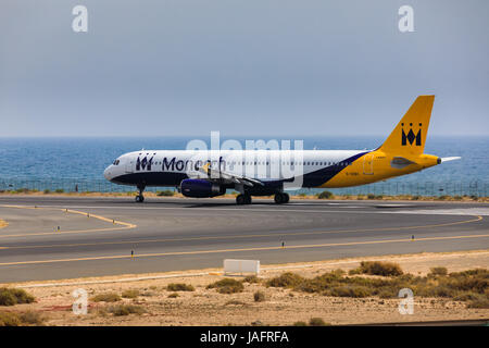 ARECIFE, SPAIN - APRIL, 16 2017: AirBus A321 of Monarch Airlines with the registration G-OZBU ready to take off at Lanzarote Airport Stock Photo