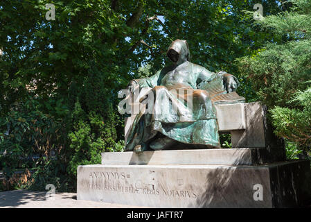 Statue of hooded seated man in the grounds of Vajdahunyad Castle, Budapest, Hungary Stock Photo