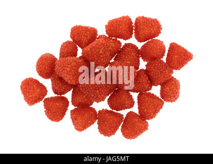 Top view of several raspberry shaped candies isolated on a white background. Stock Photo