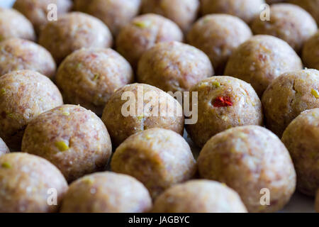 Raw Uncooked Meatballs on a Plate Before Cooking Stock Photo