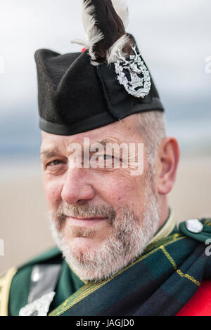 John Mackintosh is a traditional Scottish Bagpiper. He had a career as a Piper in the British Army, the Edinburgh City Police Pipe Band and the Lothia Stock Photo