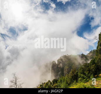 Pillar Rocks of Kodaikanal are set of three giant rock pillars which stand 122 metres (400 ft) high and is managed by the Tamil Nadu (India) Forest De Stock Photo