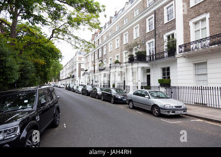 London, United Kingdom, 7 may 2017: trees and street in london kensington Stock Photo