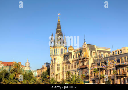 Building with an astronomical clock on the corner of Europe Square. Batumi. Georgia. Stock Photo