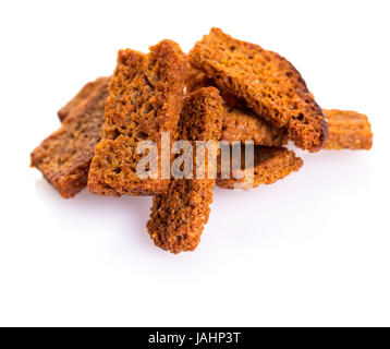 Slices of rye croutons on a white isolated background Stock Photo