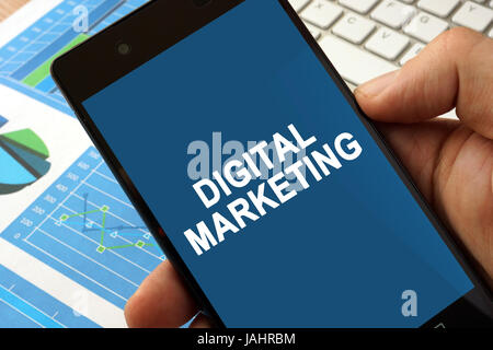 Hand with smartphone  and app digital marketing. Stock Photo