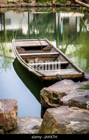 Old boat, Keyuan Garden, Suzhou, Jiangsu Province, China Stock Photo