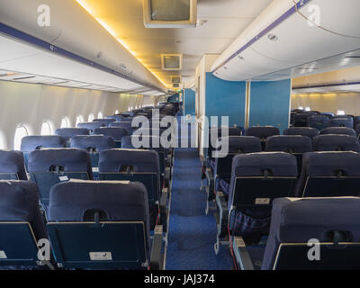 Inside the passenger cabin of a jumbo jet airliner Stock Photo
