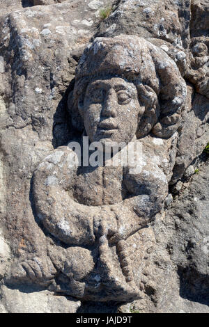 The Rotheneuf Carved Rocks are located a few kilometers east of St-Malo along the Côte d'Emeraude. They consist of a cliff a local priest, the Abbé Fo Stock Photo