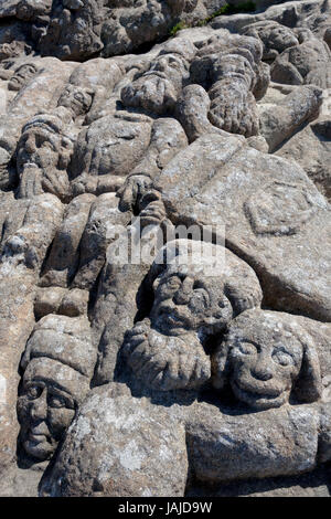 The Rotheneuf Carved Rocks are located a few kilometers east of St-Malo along the Côte d'Emeraude. They consist of a cliff a local priest, the Abbé Fo Stock Photo