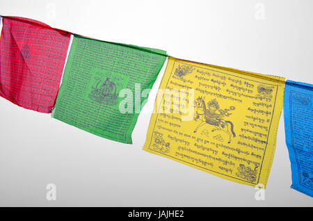 Colorful Buddhism prayer flags (Dar Cho, lungta) with Buddism symbols. Stock Photo