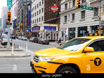 Billboards with Late Show with Stephen Colbert and Tourist at Broadway in Times Square, Manhattan, New York City Stock Photo