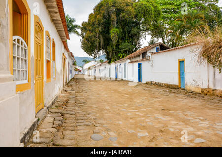 Street with old houses in colonial style with the traditional architecture of the city of Paraty in Rio de Janeiro Stock Photo